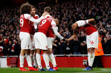 Arsenal pile misery on Tottenham as first-half blasts earn north London derby win