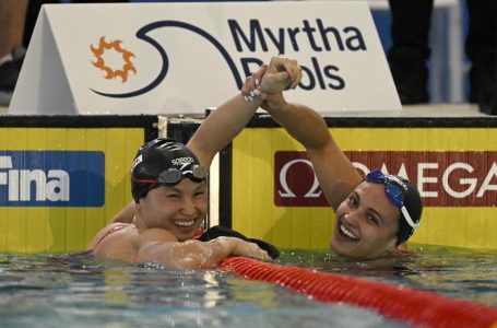 Maggie Mac Neil swims to 2nd world record, 3rd gold medal at short course worlds